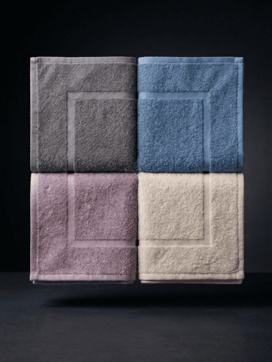 Colorful Sonno Velato bathroom tappetini with soft, slip-resistant mats in various vibrant shades for bathroom comfort and safety.