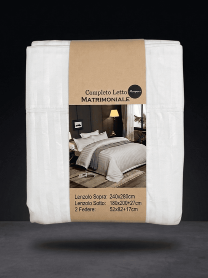 White double bed linen set by Novel Maison, including pillowcases and duvet cover, for a comfortable matrimonial bedroom.